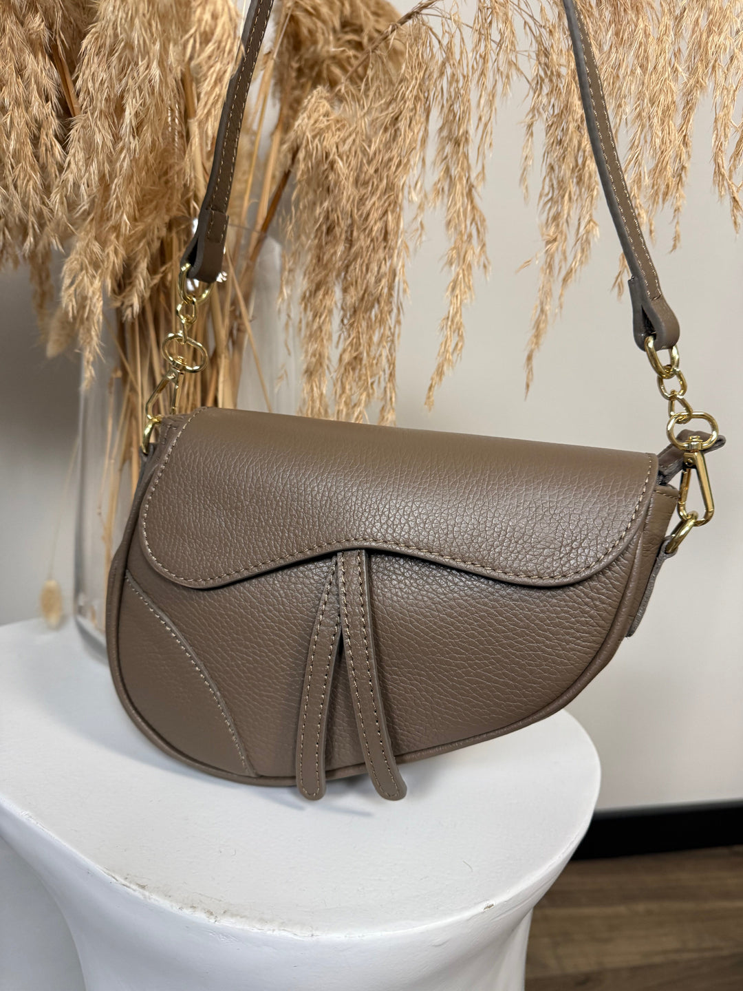 Inspired leather saddle bag